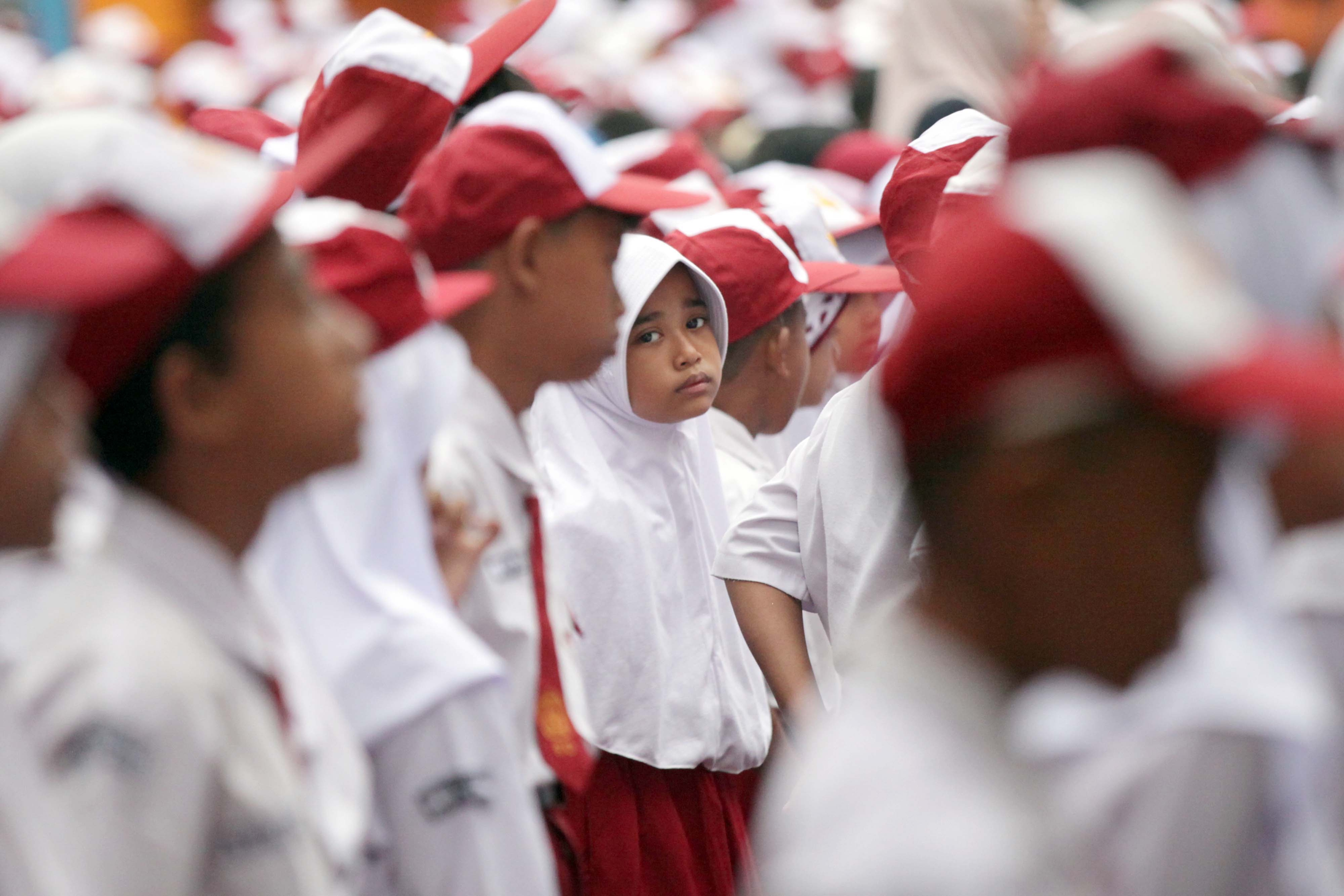 Hukum Mengikuti Upacara Bendera Merah Putih dalam Islam