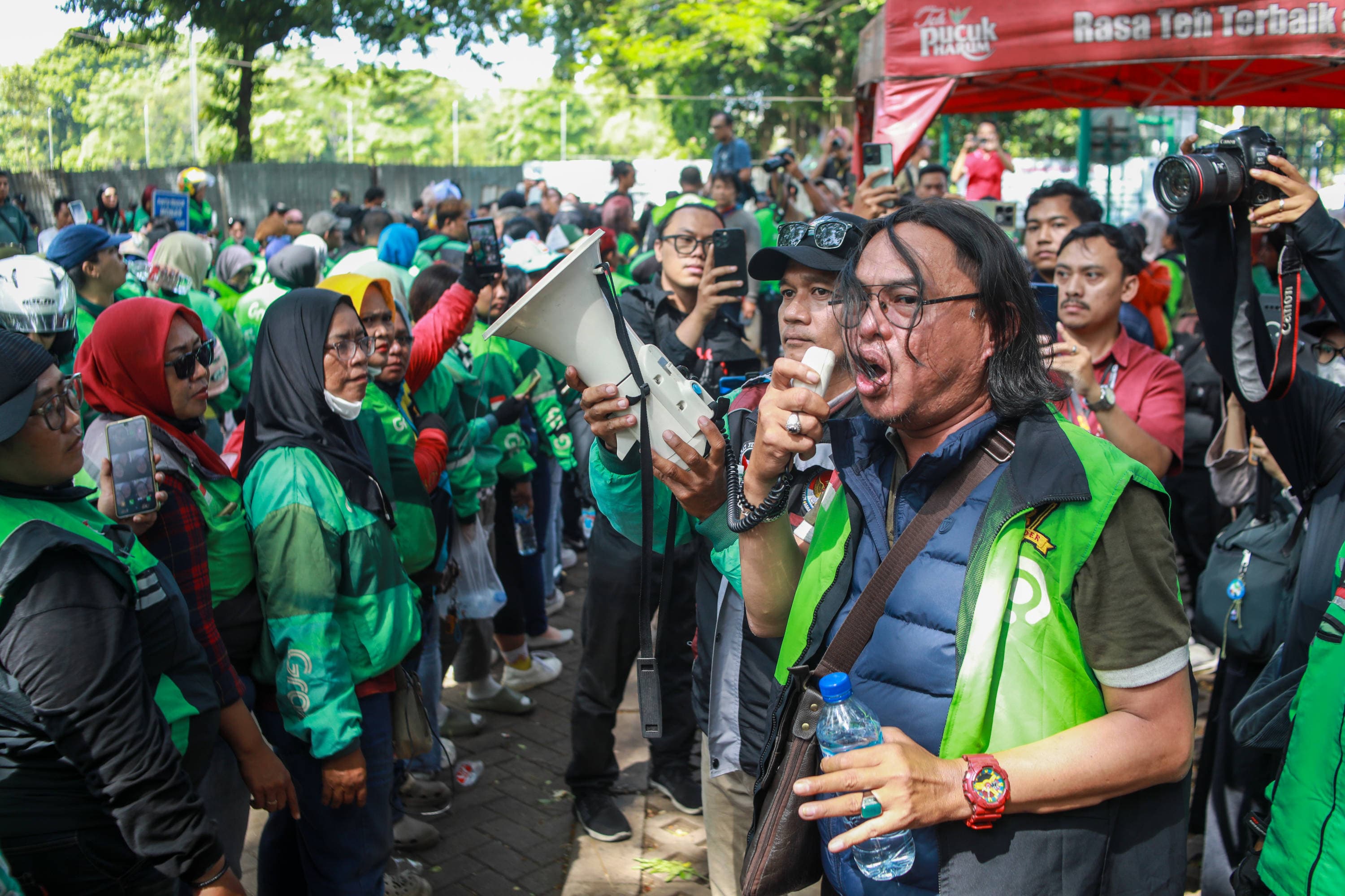 Membaca Pola Peta Regulasi, Antara Kesejahteraan Pengemudi dan Kepentingan Negara